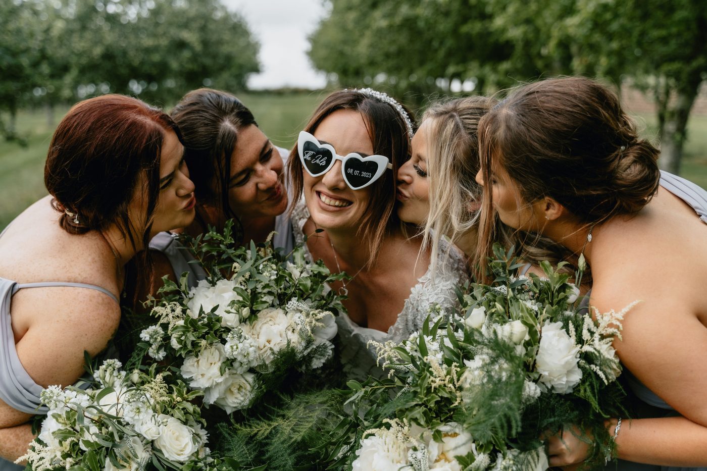 Bridal party in Orchard, wedding tipis, tipi wedding venues, outdoor wedding venues near me, apple orchard wedding, relaxed wedding venues