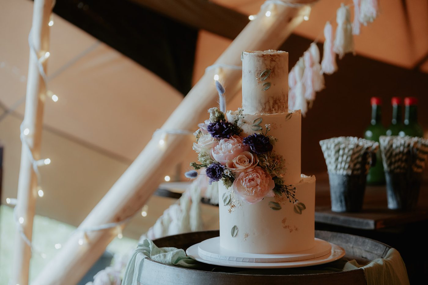 wedding cake in tipi, tipi tent wedding, unique wedding venues, tipi wedding venue near me, wedding tipis, wedding venue hereford